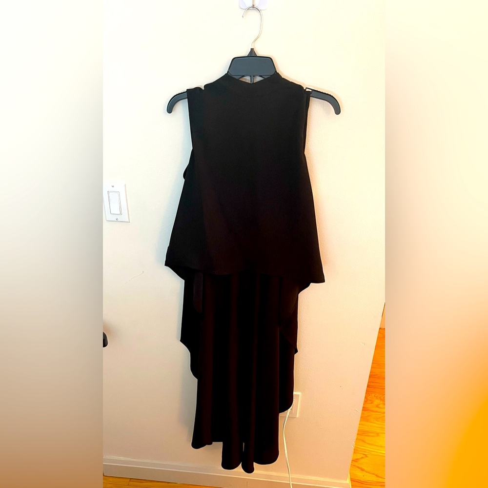 Mock neck high low top. Brand New- never worn- tags still attached